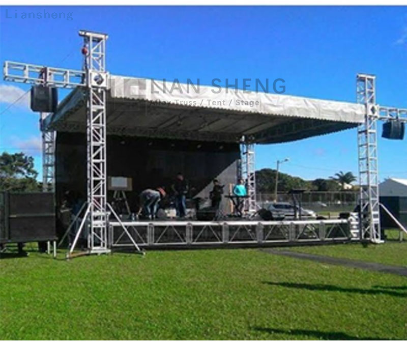 Podio da palco per concerti all'aperto con illuminazione per concerti all'aperto in vendita calda, con supporto per traliccio, con sistema di sollevamento a traliccio